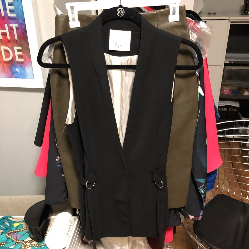 Black vest with silver detail